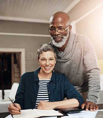 Buy stock photo Mature couple, portrait and notebook for planning finance, retirement funding and investment or asset management at home. Happy, elderly man and woman with information, writing and pension savings