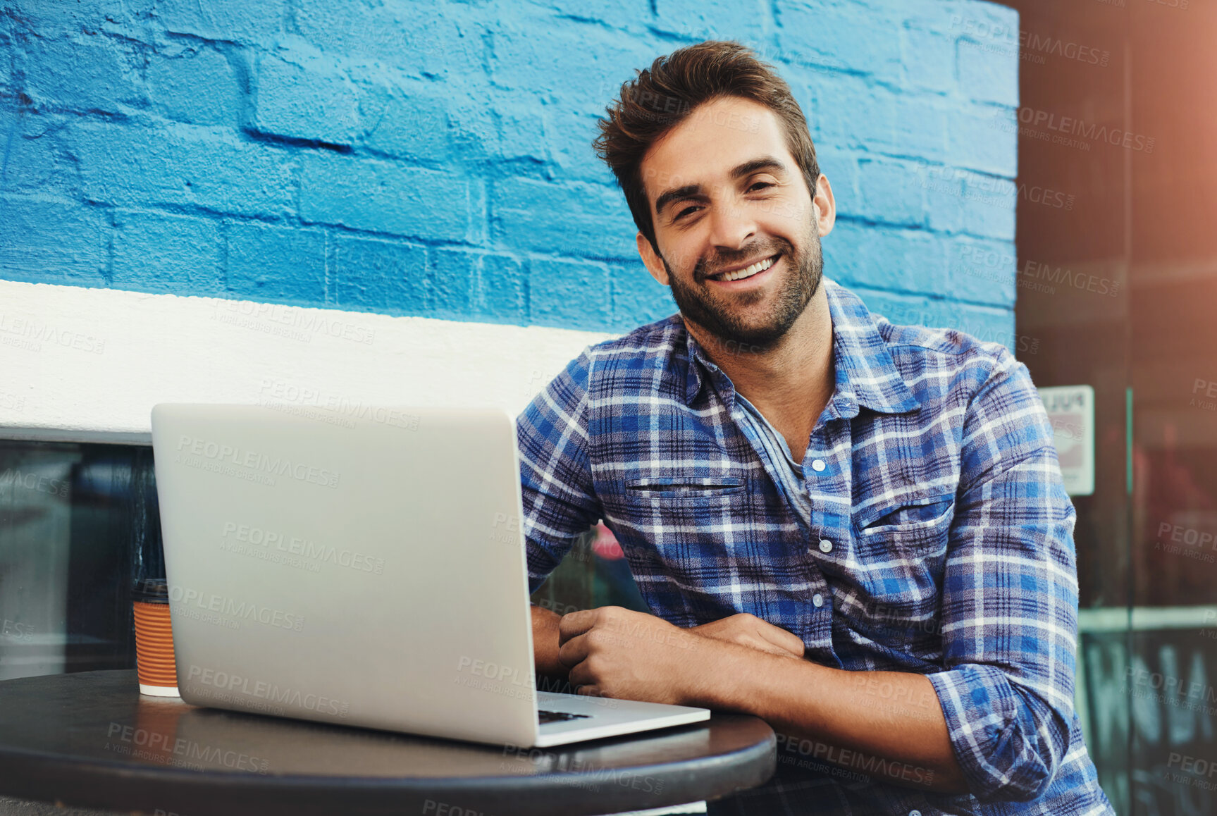 Buy stock photo Man, laptop and portrait in cafe for remote work with smile for coffee to start morning with copywriting. Person, writer or editor with computer, happy and freelance job on web at restaurant in Italy