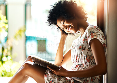 Buy stock photo African woman, reading book and smile by window, sunshine and relax with poetry in morning at apartment. Person, happy and literature for knowledge, learning and story in fantasy novel in house