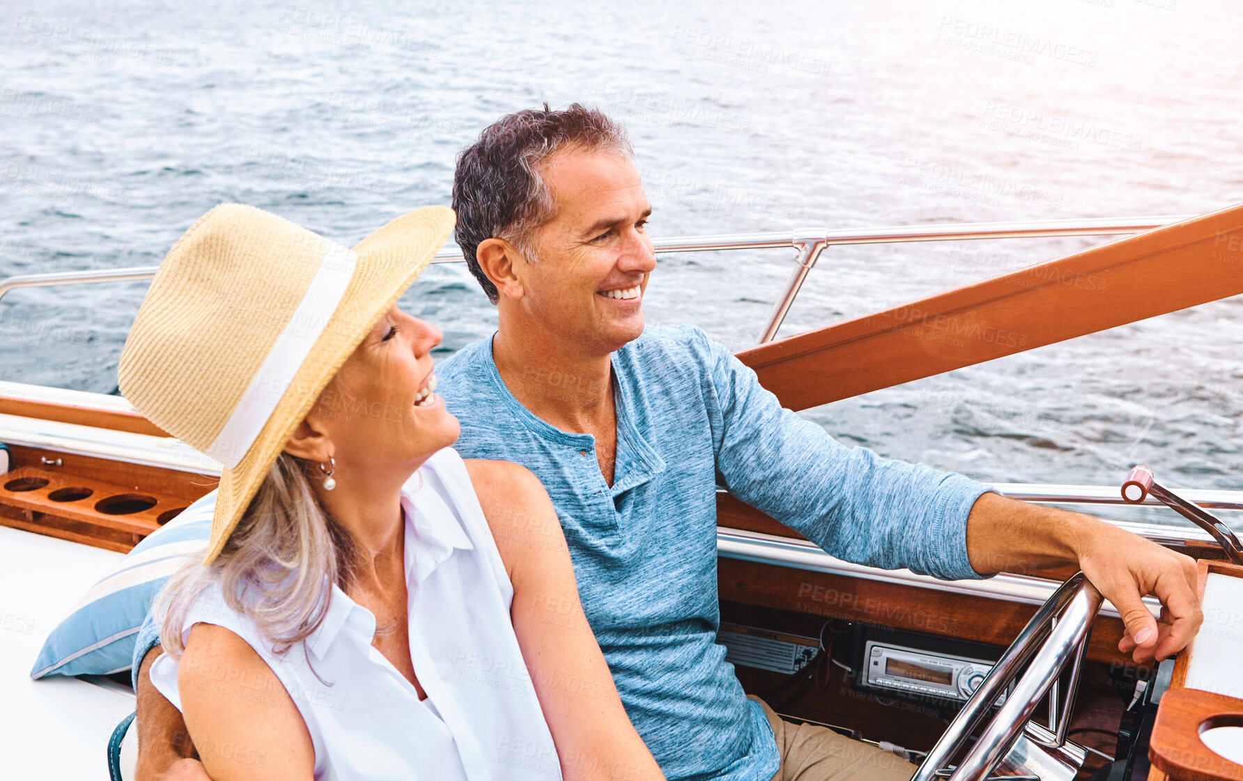 Buy stock photo Happy couple, lake adventure and together in boat on holiday, relax on cruise date for retirement travel. Mature, woman and man driving on water yacht for vacation with happiness, summer in Bali