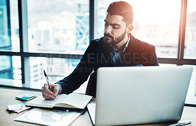 Buy stock photo Laptop, notebook and business man in office for financial analysis, company review and planning. Corporate, consultant and person writing notes with computer for research, website and report