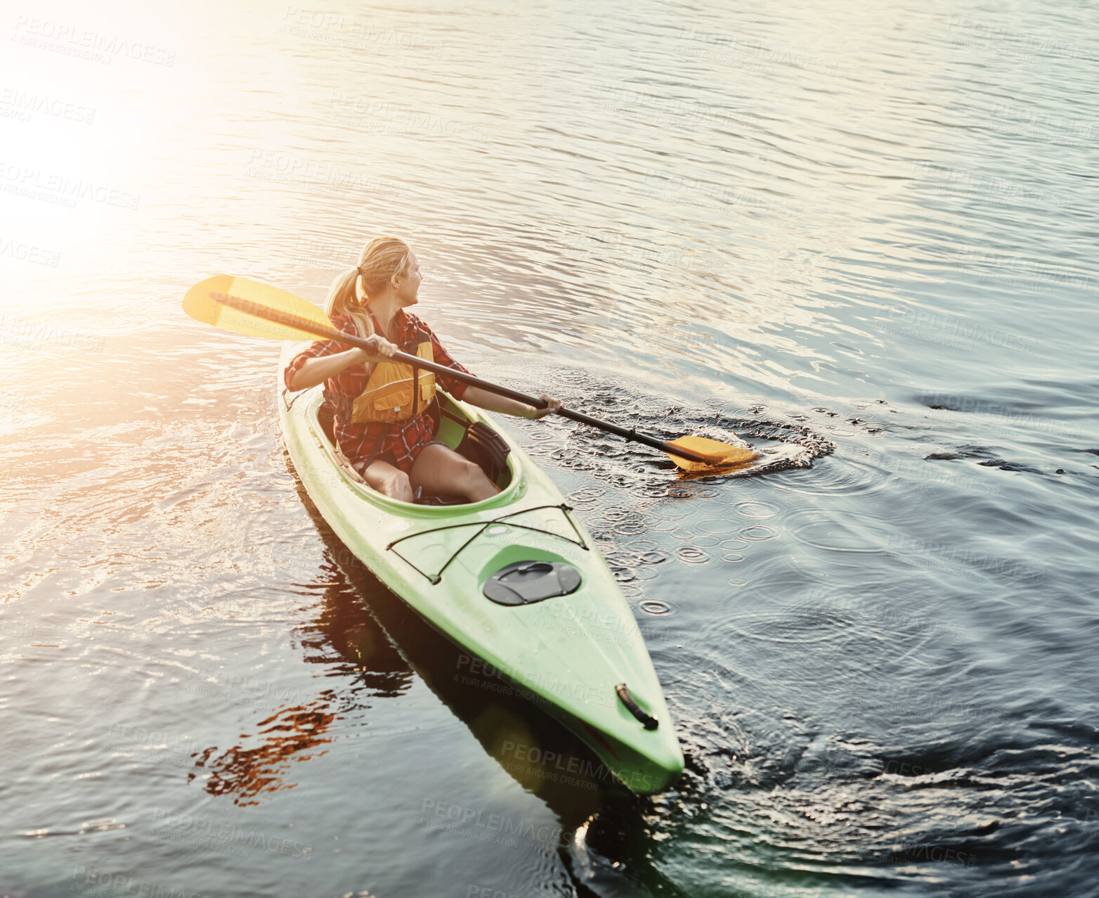 Buy stock photo Hobby, lake and woman rowing kayak outdoor for holiday, leisure or vacation in fresh air of nature. Adventure, travel and water with tourist person in river from above for break, journey or trip