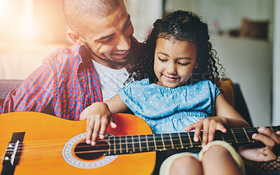 Buy stock photo Guitar, music or teaching with father and daughter in home living room together for bonding. Instrument, love or smile with single parent man and girl child in apartment for development or learning