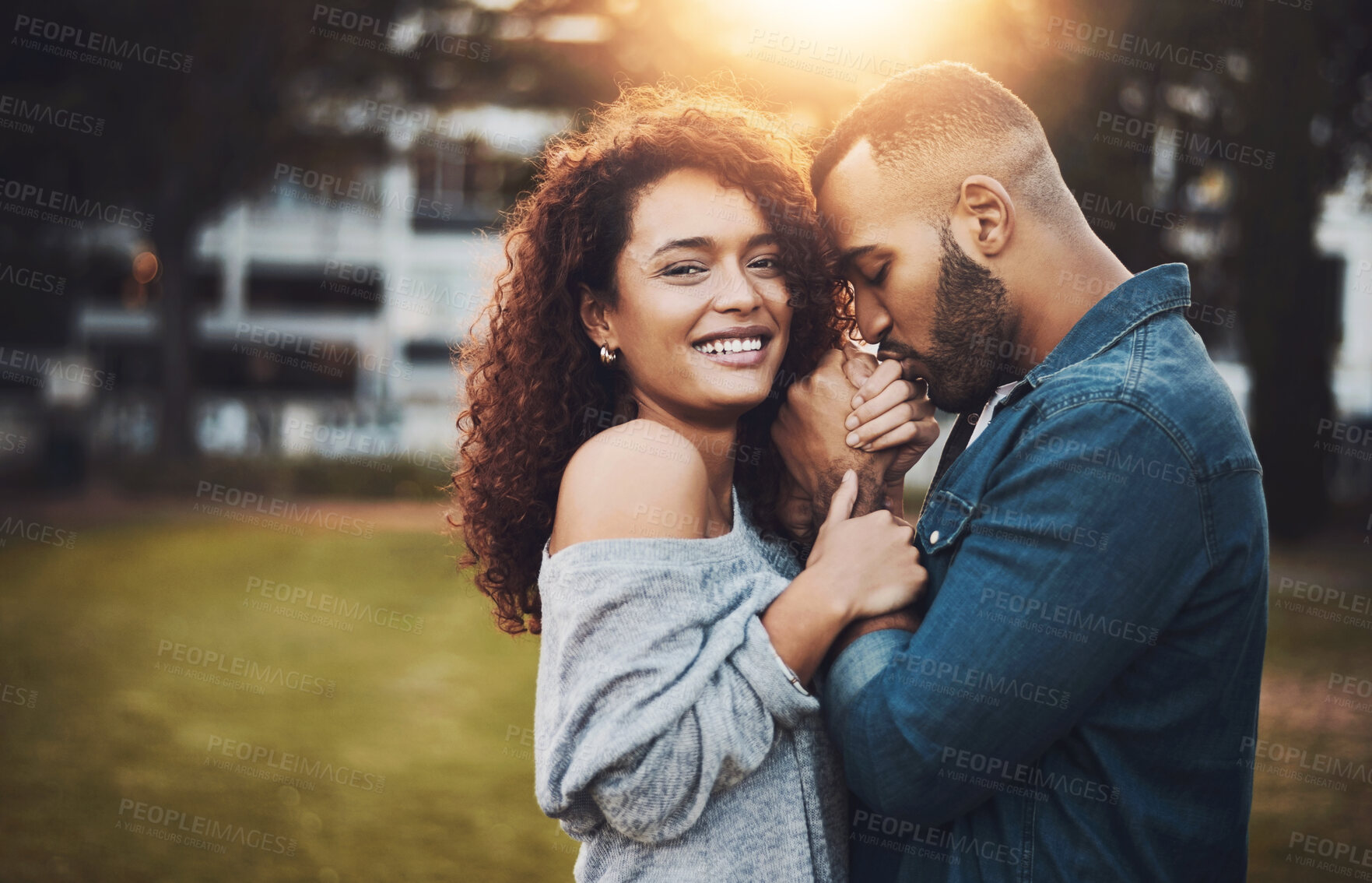 Buy stock photo Nature, kiss and man with hand of wife for love, care and bonding together in outdoor park. Smile, marriage and portrait of couple with trust, romance and embrace on date in field or garden in Mexico