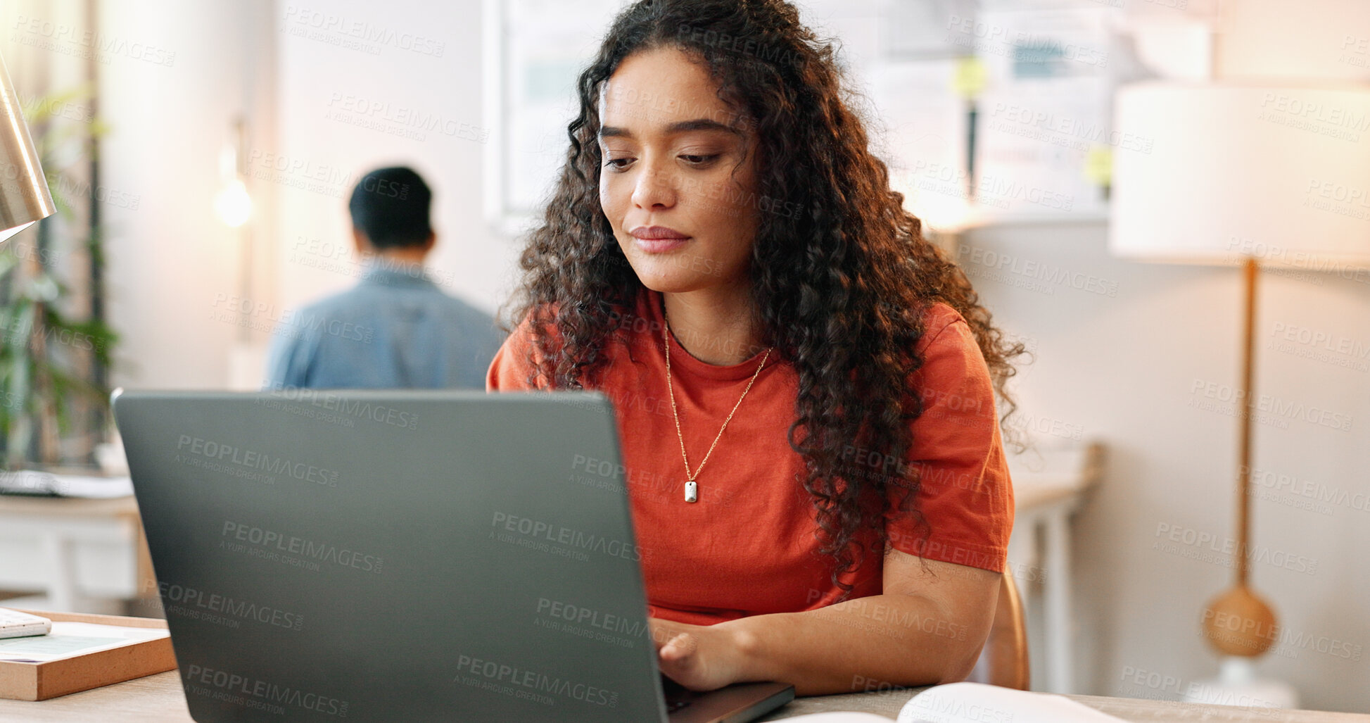 Buy stock photo Typing, woman and smile at desk with laptop, communication and update in office. Female journalist, research and happy at computer for article, social media and contact in modern workplace in city