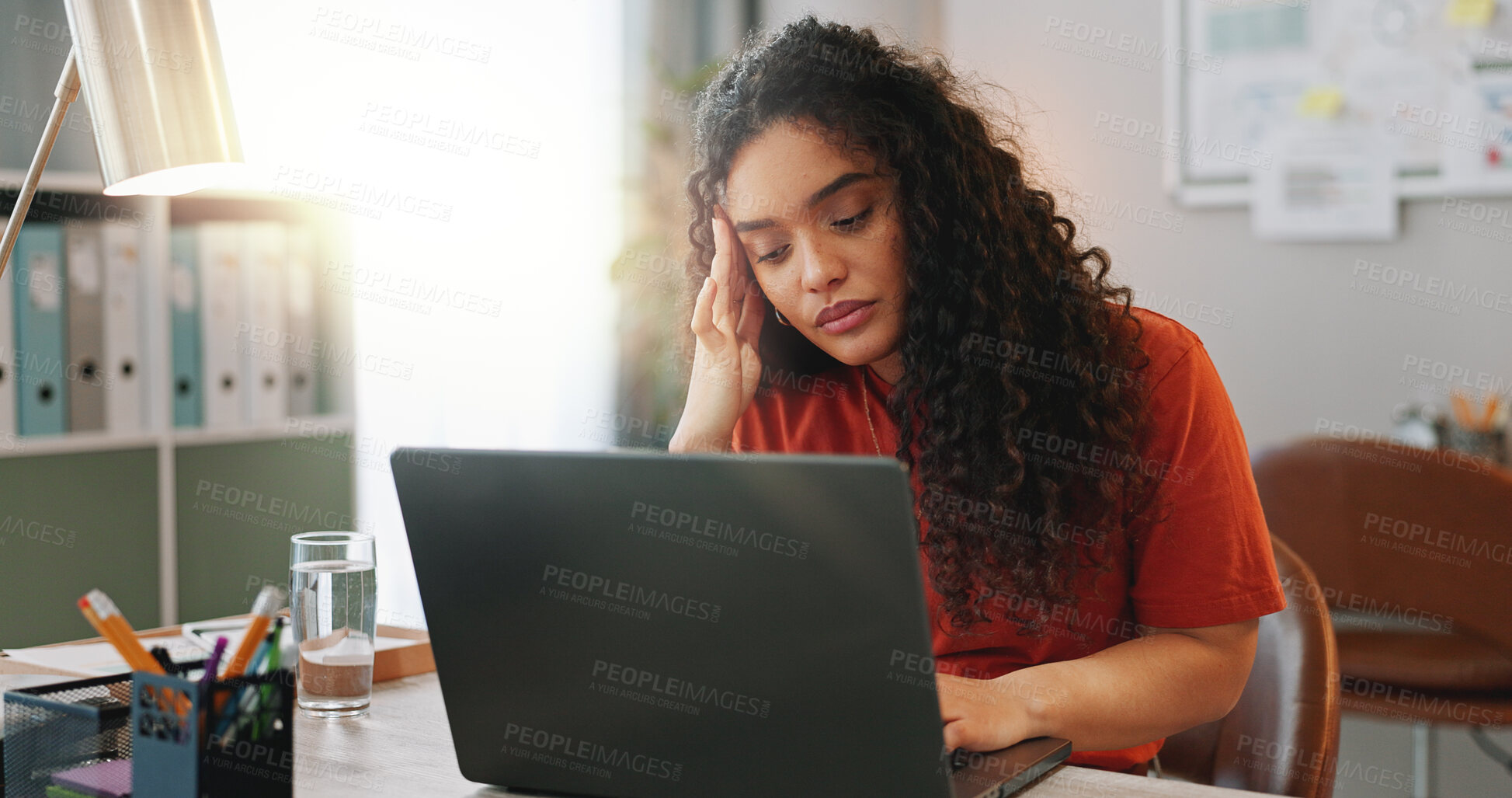 Buy stock photo Headache, laptop and problem solving with designer woman in creative workplace for project management. Burnout. computer and stress with unhappy employee at desk in office for online administration