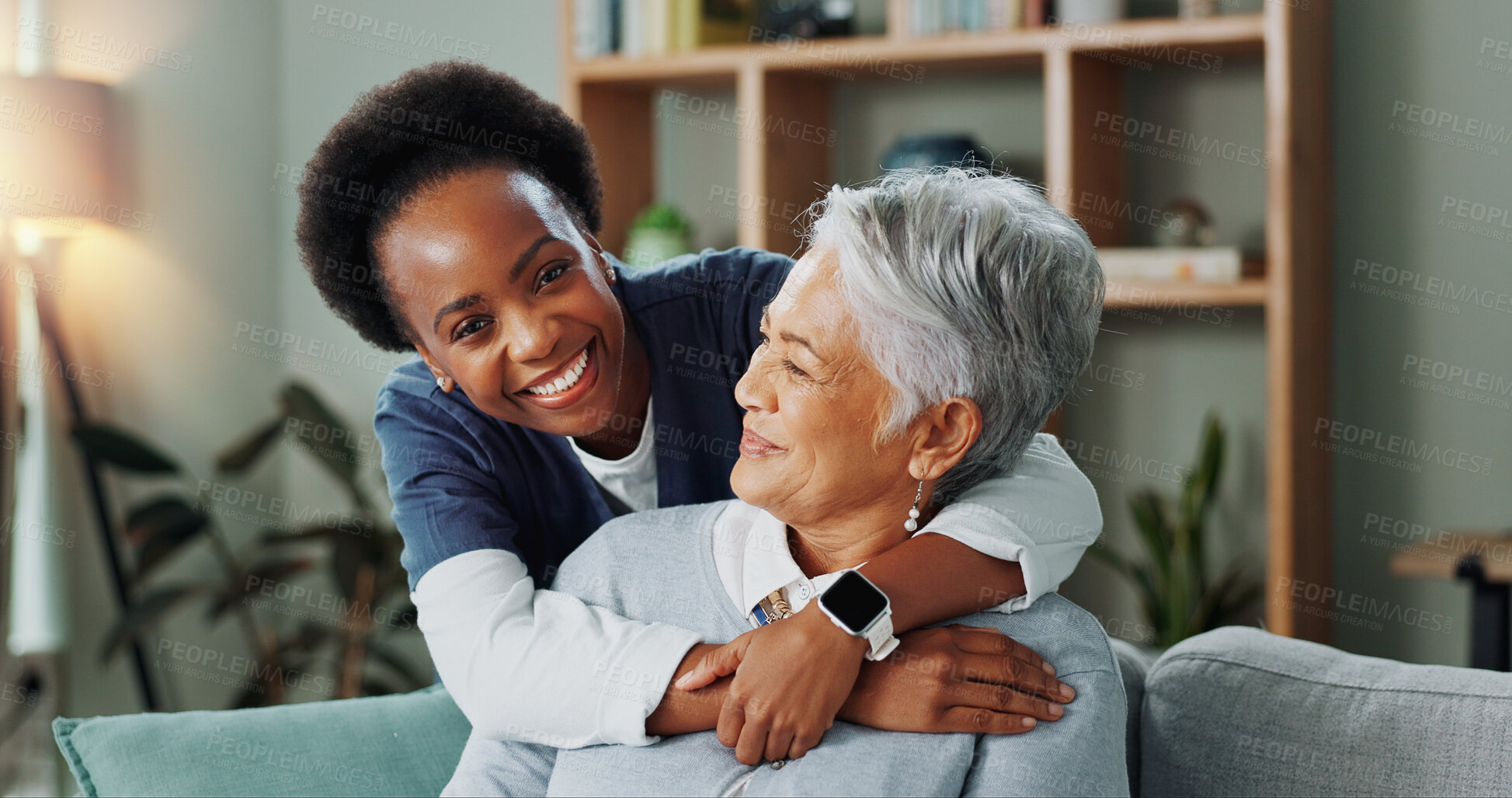 Buy stock photo Assisted living, hug or love with nurse and old woman on sofa in lounge of nursing home together, Happy, smile or support with medicine professional and senior patient embracing in apartment