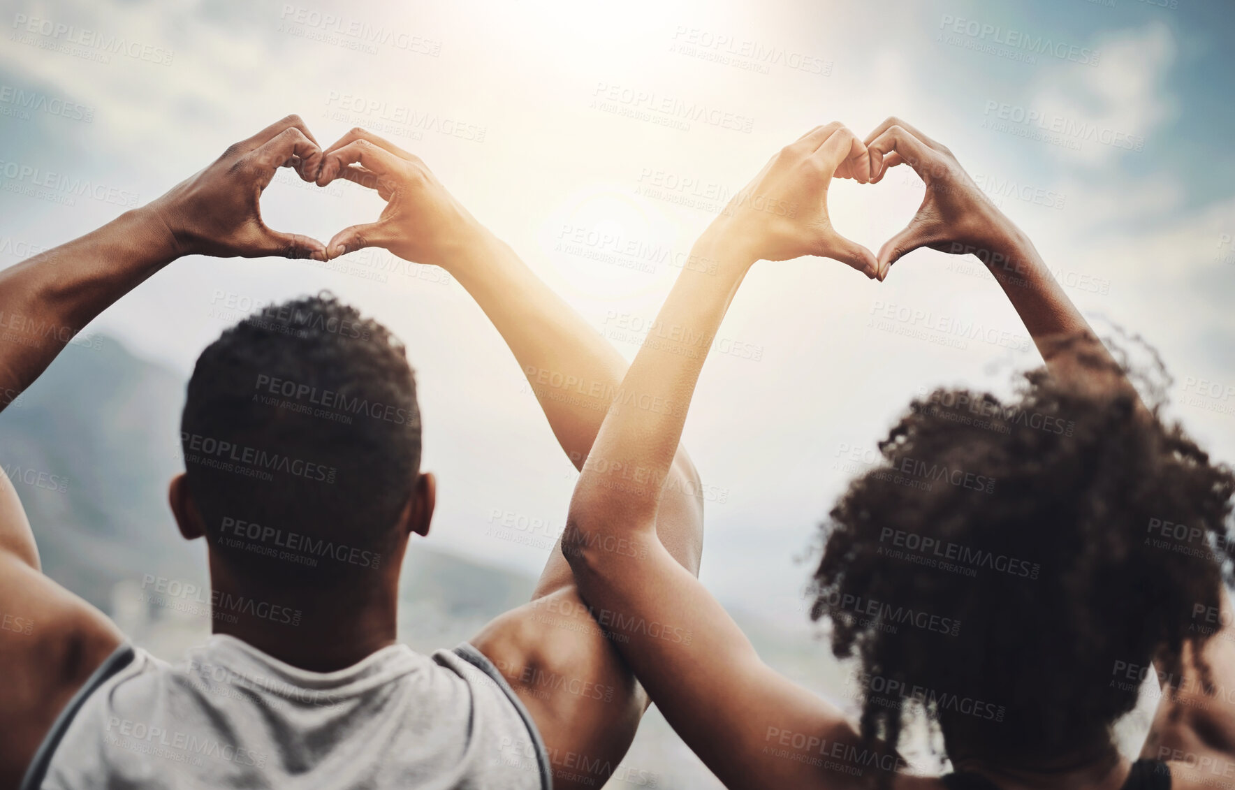Buy stock photo Hands in heart, fitness and couple in city for exercise, back view and cardio workout together. Dating, outdoors and man and woman with emoji, gesture and love sign for wellness, health and sports