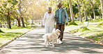 Love, senior couple and pet outdoor on walk together for group exercise, health and wellness in park. Active, senior man and woman in nature with labrador animal for morning adventure and retirement