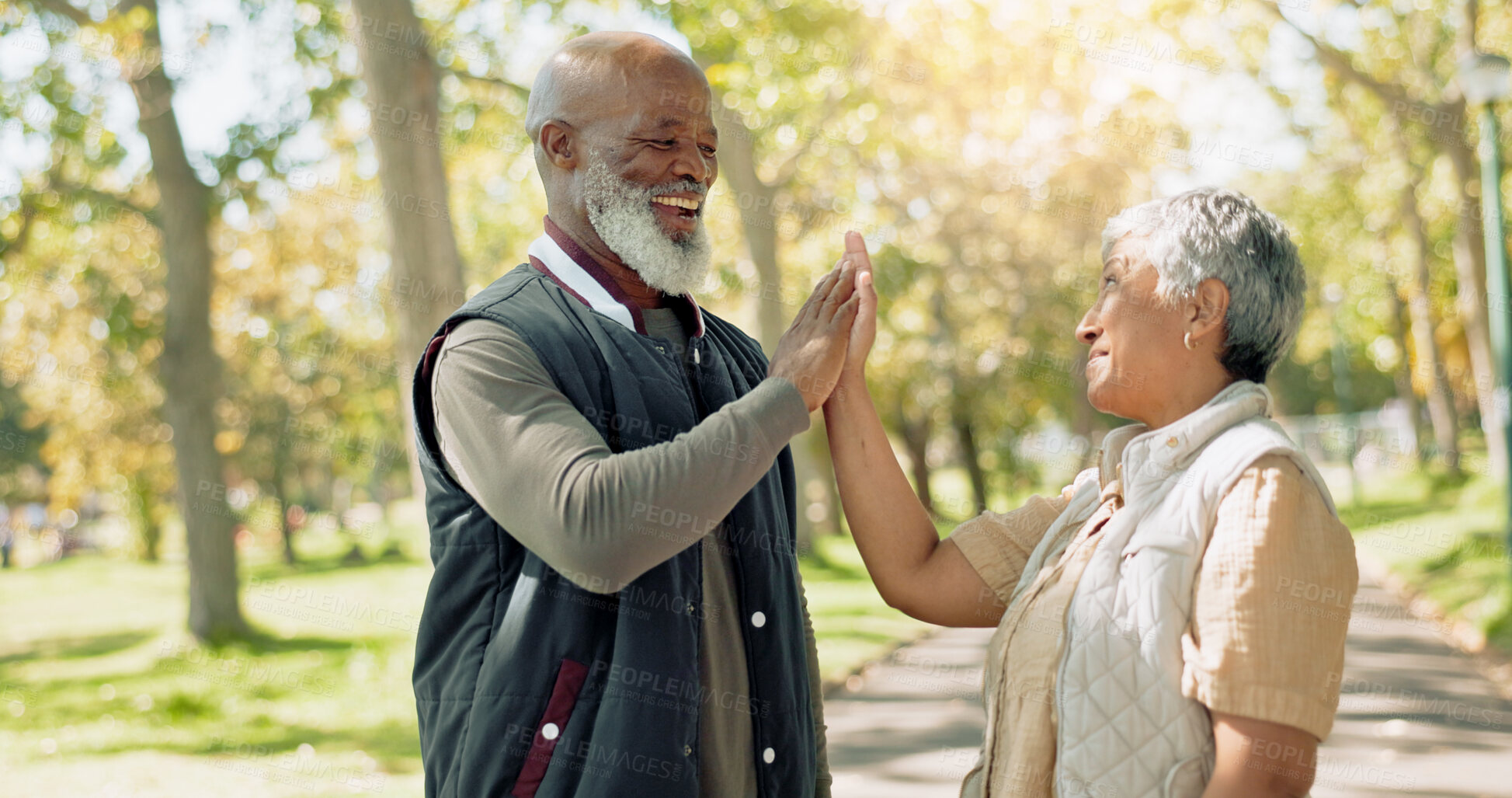 Buy stock photo Senior couple, fitness and high five outdoor for wellness, health and well done with support, success or goals. Happy, elderly people and hands together for exercise, cardio and training in nature