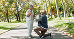 Marriage, mature couple and kneeling for proposal outdoor in park for love gesture and relationship. Wow, senior people and engagement or announcement in nature for support, commitment and dedication