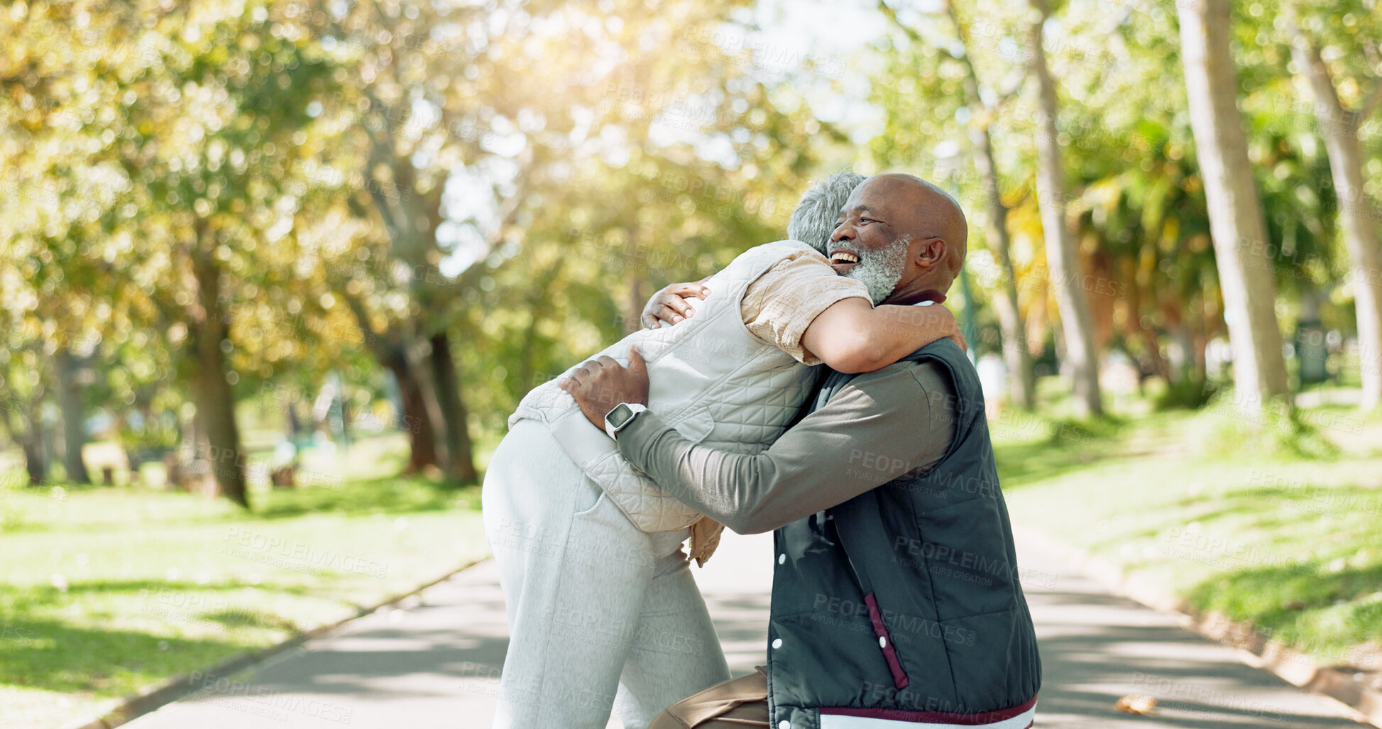 Buy stock photo Happy and mature couple hugging outdoor at park for commitment, relationship and wellness. Smile, black man and woman with love embrace in nature for empathy, support and dedication to marriage