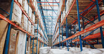 Warehouse interior, logistics and storage for stock with inventory and shipping business. Factory, supply chain and distribution plant with retail product or package for export industry and ecommerce