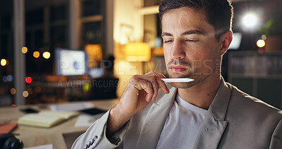 Buy stock photo Problem solving, pen and thinking with business man in office at night for administration or deadline. Idea, stylus and web design with serious professional in workplace for evening contemplation