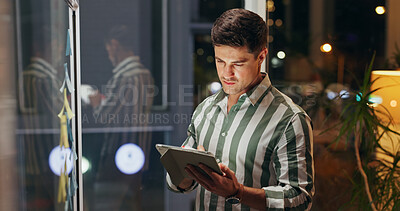 Buy stock photo Night, consultant and man with tablet, typing and decision with connection, thinking and stock market. Person, evening or employee with tech, agency or website for trading, app or solution with news