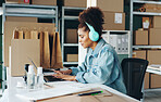 Courier business, woman and laptop in office for ecommerce, online service and manage delivery. Female owner, supplier and computer for typing, digital inventory and headphones for radio podcast