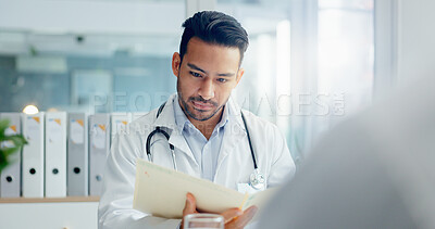 Buy stock photo Man, doctor and documents with patient for medical results, insurance or consultation at hospital. Male person or healthcare employee reading paperwork for prescription, diagnosis or clinic research