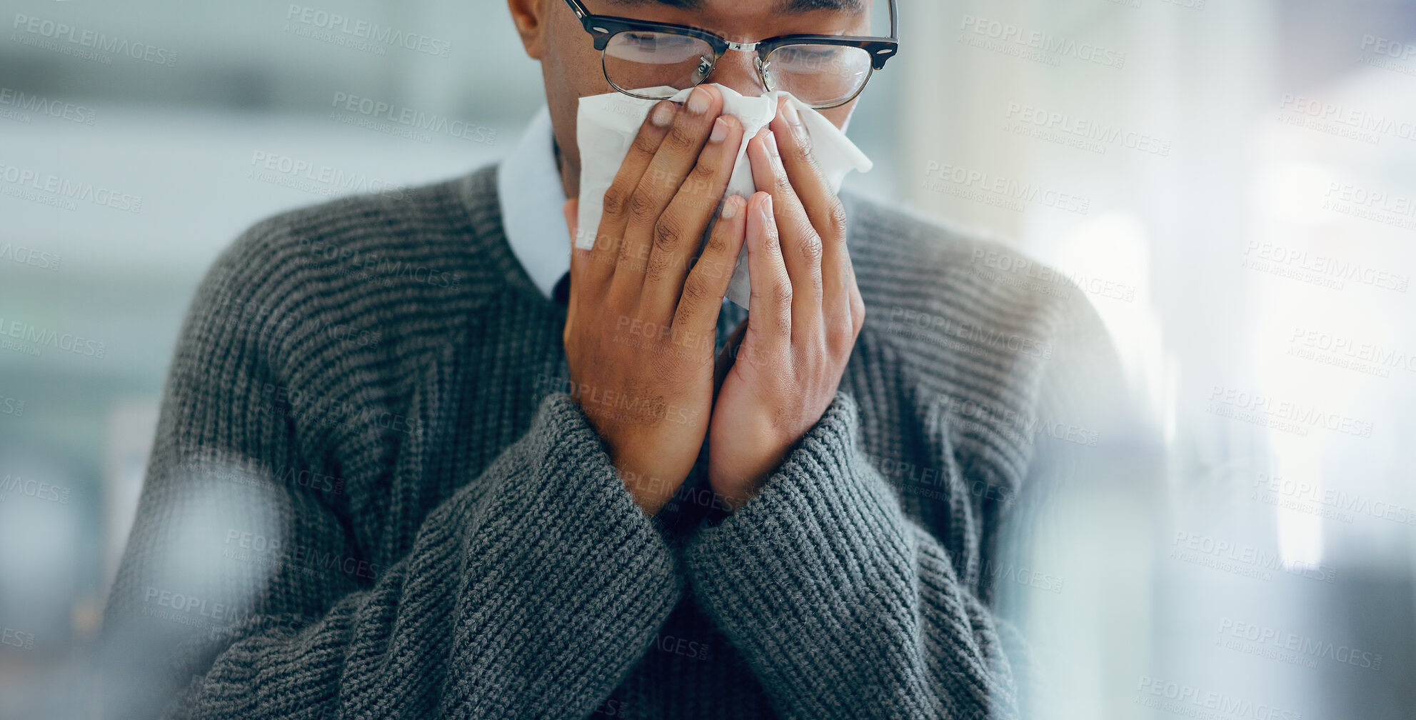 Buy stock photo Man, sick and sneezing with tissue in hand, healthcare and influenza cold or covid virus for wellness risk in office. Sinus symptoms, allergy problem and seasonal change,  hay fever and unwell person