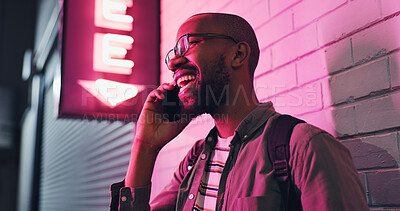 Buy stock photo Happy man, discussion and neon light with phone at night for communication outside bar, pub or club. Male person talking on call and smile in happiness on smartphone for friendly conversation in city