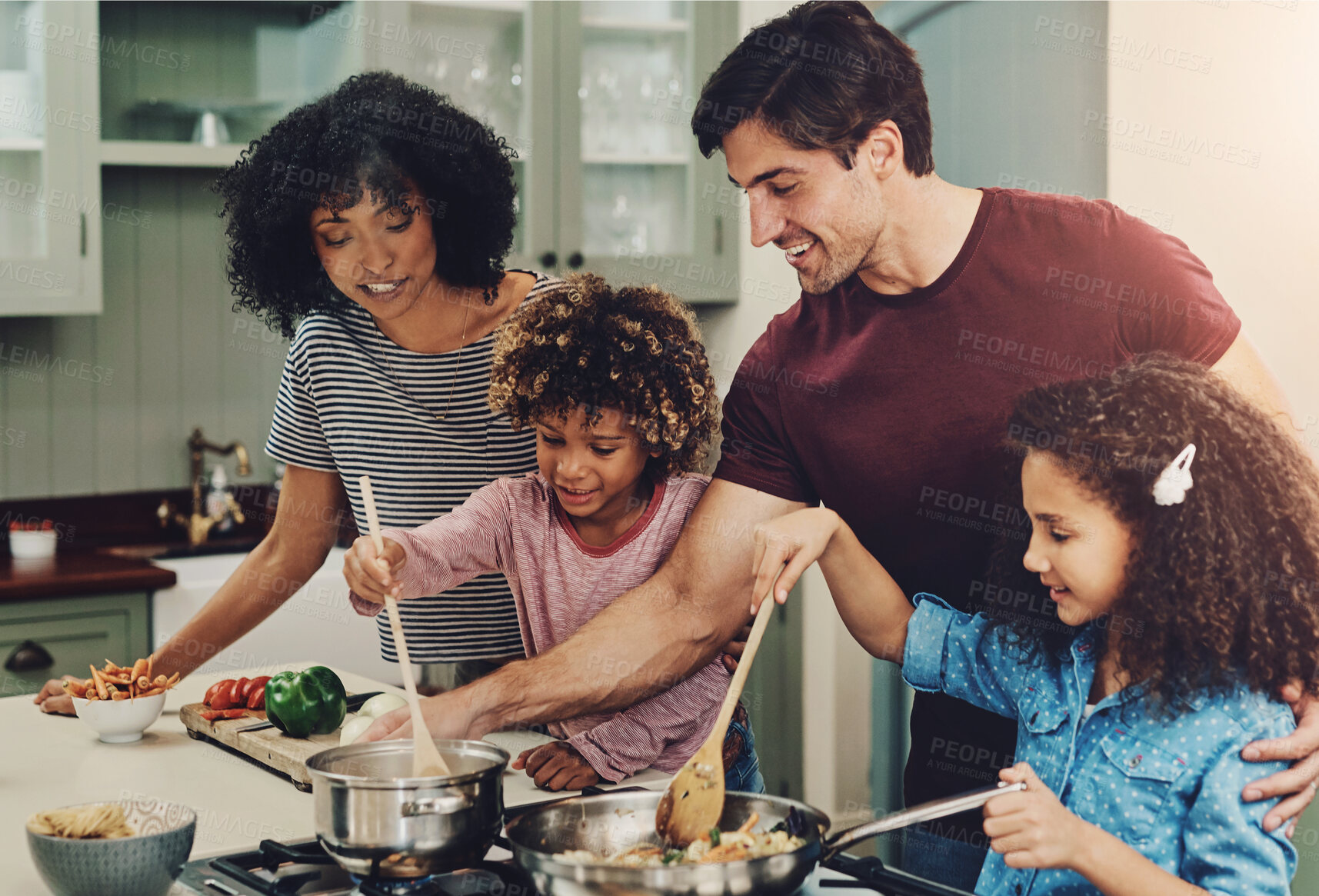 Buy stock photo Family, happy and helping for cooking in kitchen with vegetables, teaching and nutrition salad of lunch meal. Smile, interracial parents and kids for learning vegan diet, healthy dinner and house