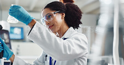 Buy stock photo Glass beaker, goggles and woman scientist in laboratory for medical study, research or experiment. Container, career and professional female person with chemical liquid for pharmaceutical innovation.