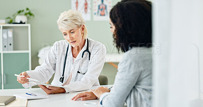 Buy stock photo Mature woman, tablet and consulting with patient for medical results, diagnosis or prescription at hospital. Female person or cardiologist talking to client in consultation with technology at clinic