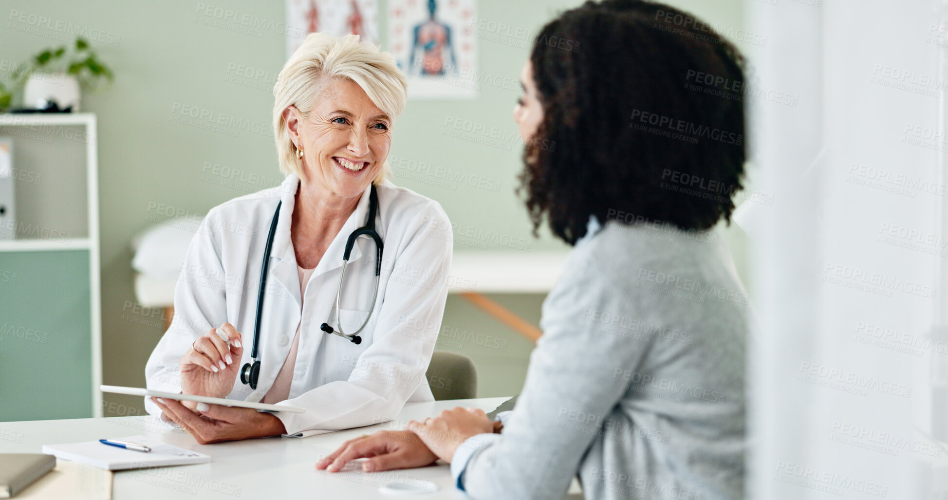 Buy stock photo Happy woman, tablet and consulting with patient for medical results, diagnosis or prescription at hospital. Mature person or cardiologist talking to client in consultation with technology at clinic