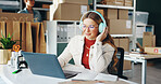 Woman, laptop and music with headphones, reading and logistics for thinking, sales report and ecommerce. Entrepreneur, computer and planning schedule for delivery, analytics or supply chain on web