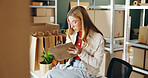 Woman, paperwork and goods for shipping in office, planning and ecommerce order for inventory. Female person, clipboard and supply chain for delivery logistics, courier stock and checklist for boxes