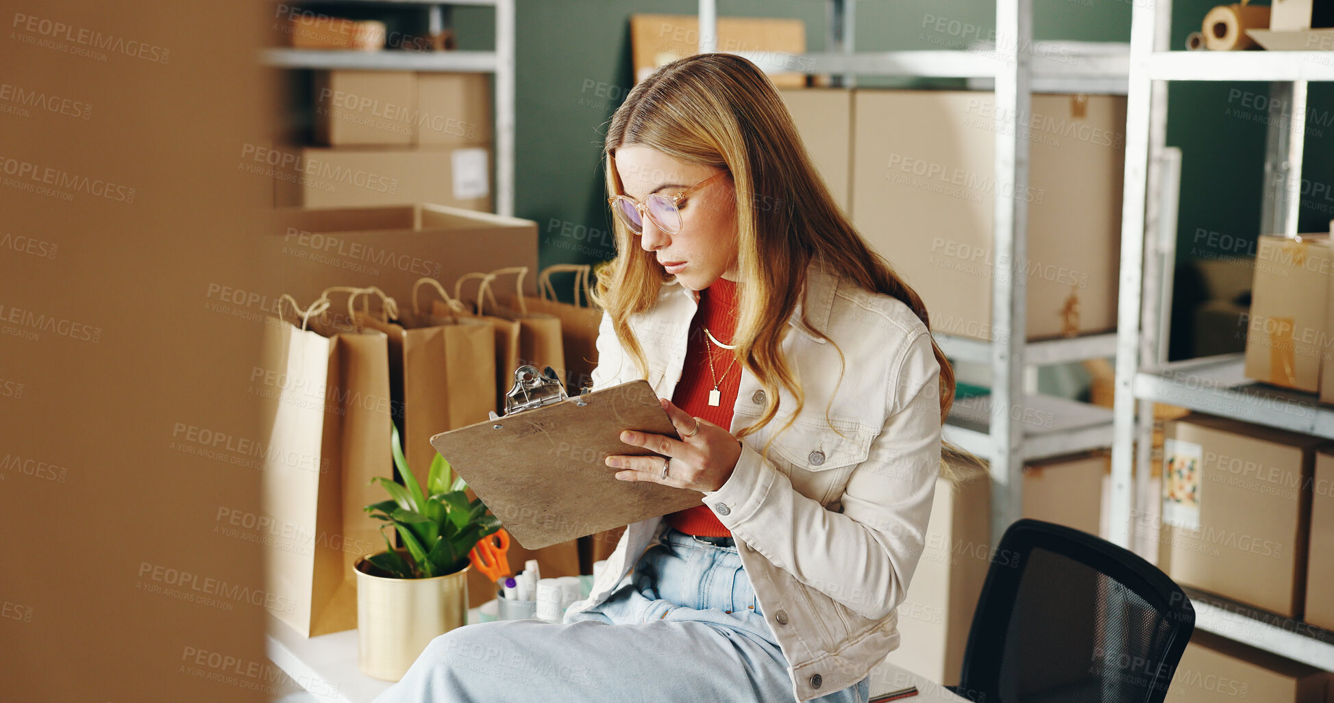 Buy stock photo Woman, paperwork and goods for shipping in office, planning and ecommerce order for inventory. Female person, clipboard and supply chain for delivery logistics, courier stock and checklist for boxes