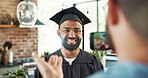 Graduation, student and happy with photo in home for certificate, diploma and success in education. Man, picture and memory for social media post, scholarship and celebration for study achievement