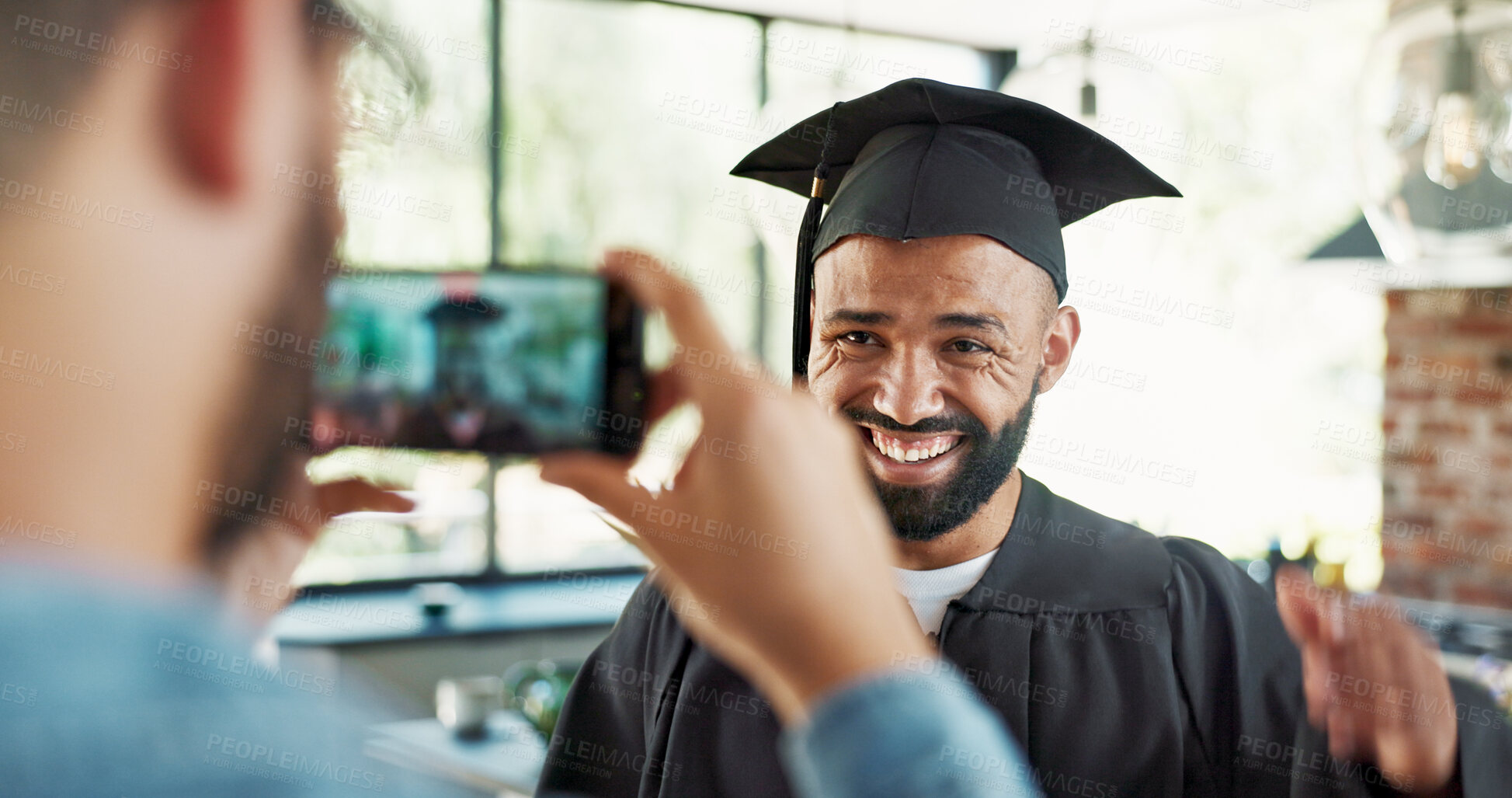 Buy stock photo Graduation, student and excited with photo in home for certificate, diploma and success in education. Man, picture and memory for social media post, scholarship and celebration for study achievement