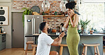 Couple, proposal and surprise with engagement in home for commitment, marriage promise or ring box on knee. People, question and romantic gesture in kitchen of house with love, future together or yes