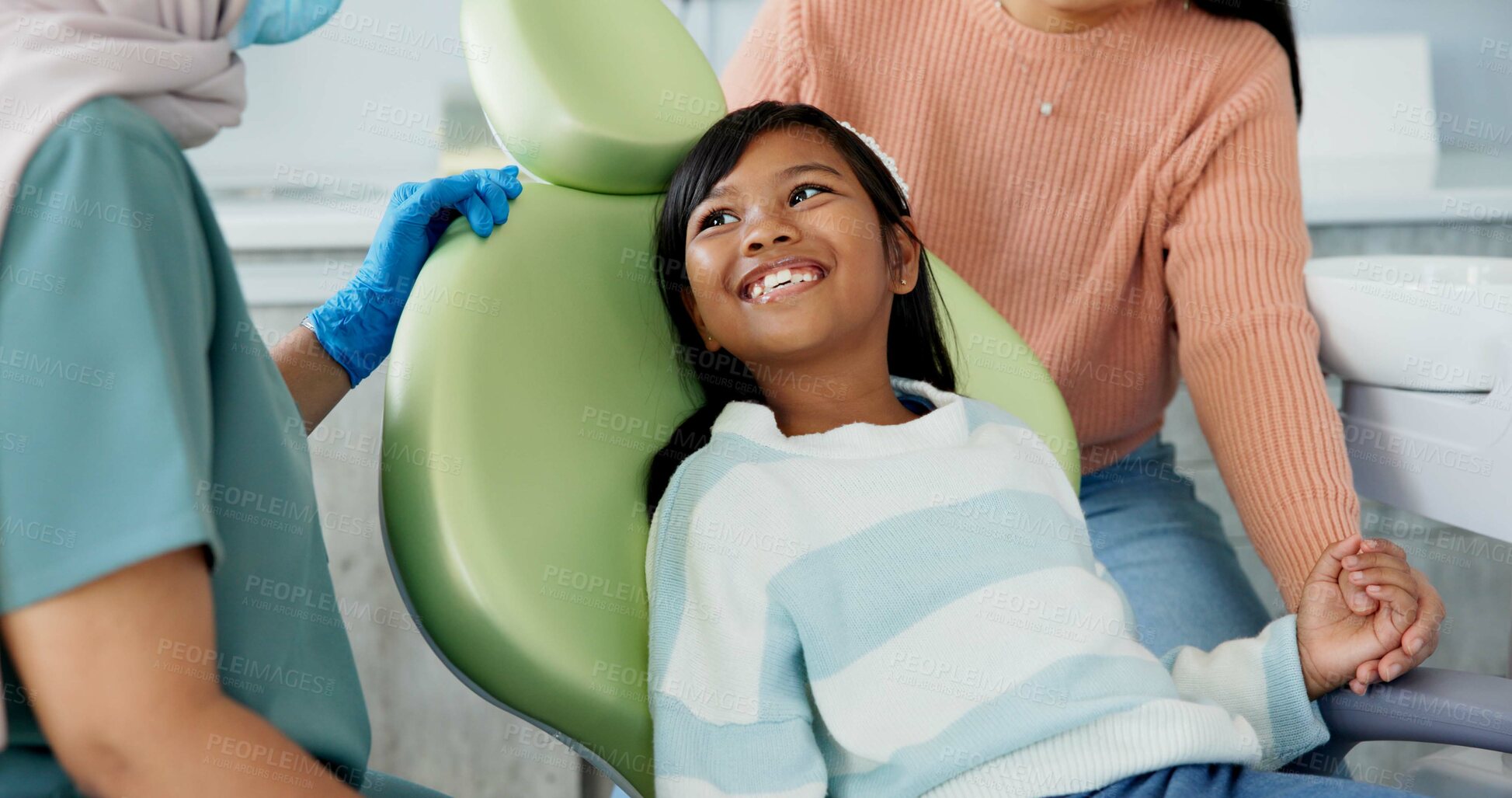 Buy stock photo Kid, dentist and appointment for teeth or oral health education for prevention on tooth decay or hygiene. Little girl, mom and together for dentistry checkup or dental examination with orthodontist.