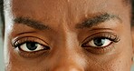 Confused, woman and closeup of eyes with frown for strain, optical care and health. Stress, question and zoom portrait of young African female person with vision, eyesight and ophthalmology.