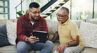 Buy stock photo Tablet, teaching and man with senior father on sofa helping with communication, internet or email. Happy, bonding and elderly male person learning digital technology with son in living room at home.