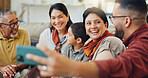 Selfie, family and man with mobile phone in living room for photography, memory or social media post. Grandparents, boy child and parents for profile picture, support or bonding together in home