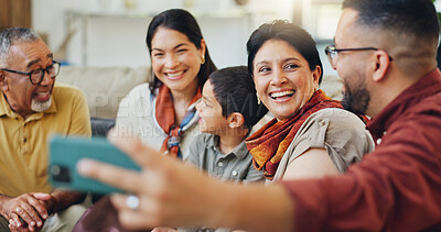 Buy stock photo Selfie, man and family with happiness in living room for photography, memory or social media post. Grandparents, boy child and parents for profile picture, support or bonding together in home