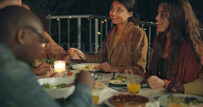 Buy stock photo Friends, happy and dinner in night, patio and talk for conversation, food and new years eve celebration. Women, man and group at table with chat, memory and comic laugh for joke, diversity and event