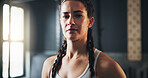 Woman, portrait and ready for training as athlete in fitness center for challenge in sports or wellness. Female person, strong and serious with pride for performance in mma, boxing match or fight