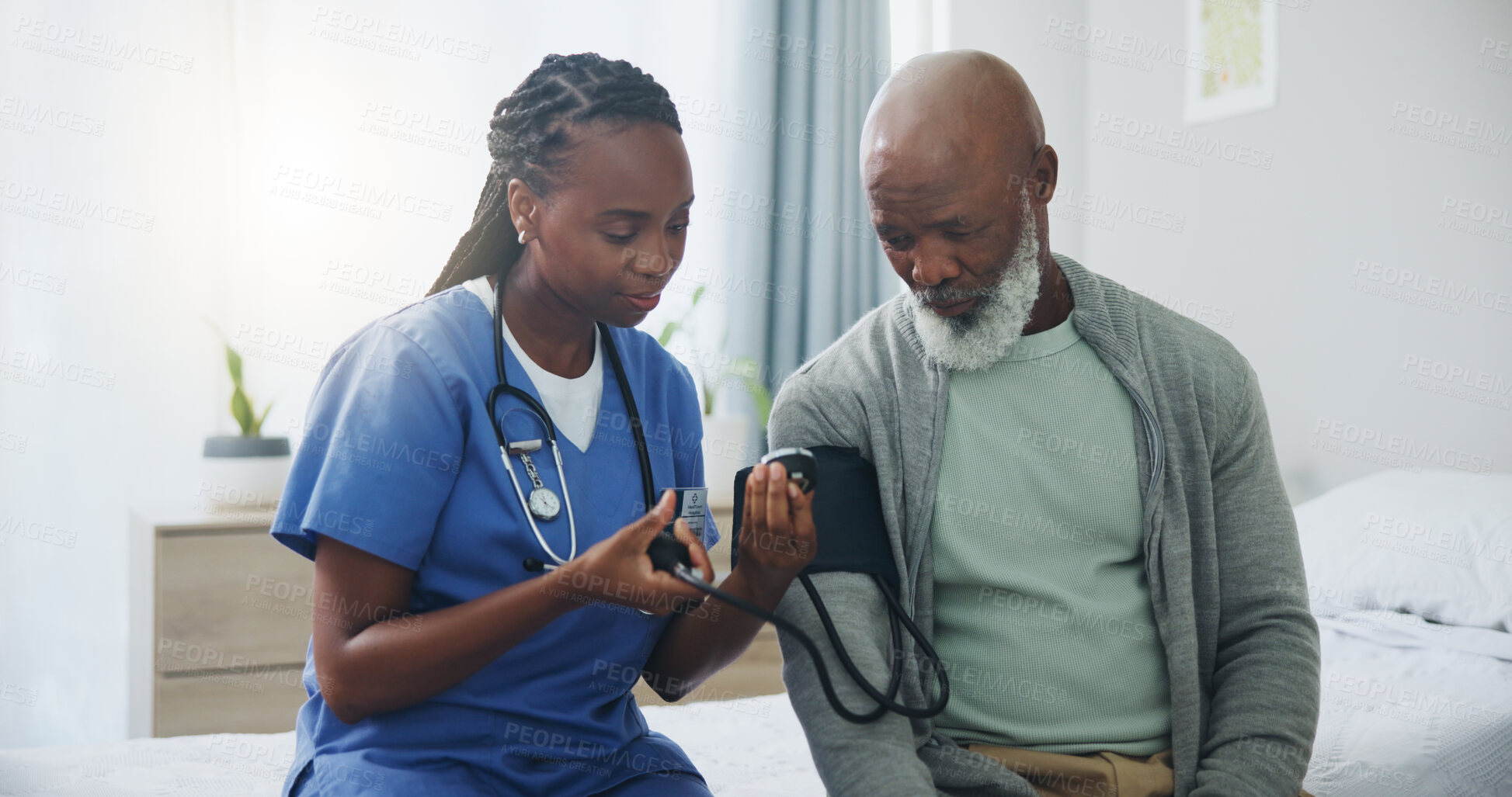 Buy stock photo Hospital, senior man and nurse with monitor for blood pressure, medical test or cardiovascular. Black people, mature patient or caregiver for hypertension diagnosis, healthcare or consultation in bed