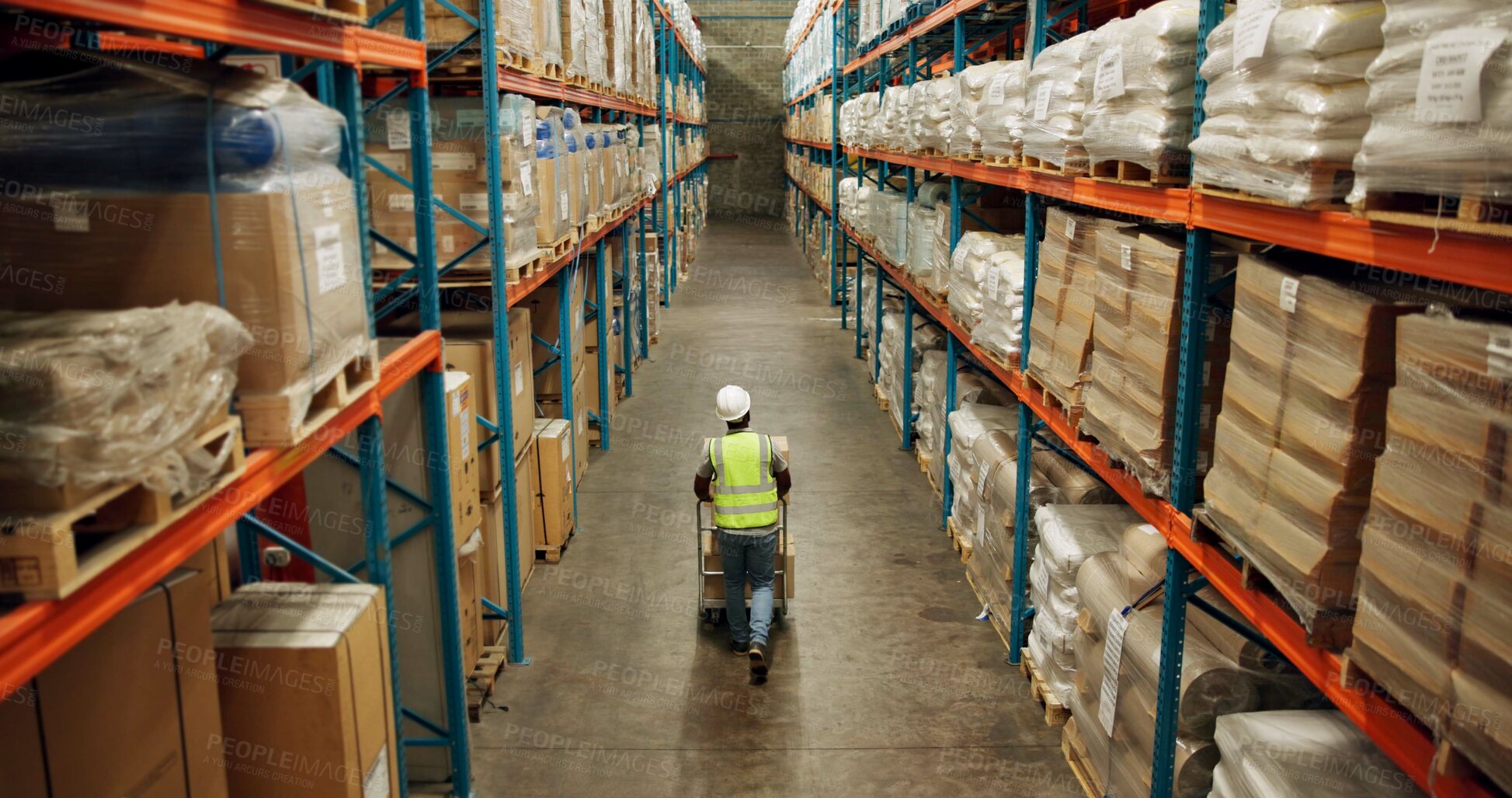 Buy stock photo Warehouse, shipping and man walking in a distribution, freight and supply chain company. Worker, contractor and back with stock, factory and export business with employee working with storage