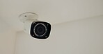 Security, safety and camera on wall by apartment for surveillance, control room and property recording. Spy, technology and moving lens for sensor protection system for criminal activity or privacy