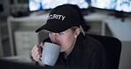 Woman, security and coffee in control room for protection, surveillance and cctv monitor for building safety. Female guard, mug for latte and night shift for privacy, services and supervision