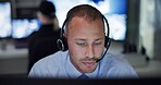 Safety, man and headset in control room for communication, surveillance and supervision or building security. Male guard, contact or cctv monitors with telecom advice for check, support or protection