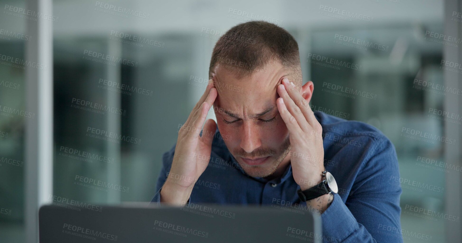 Buy stock photo Laptop, migraine and man in office, night and tired of copywriting, hand and burnout for deadline. Computer, editing and employee working late, professional and fatigue with headache and project