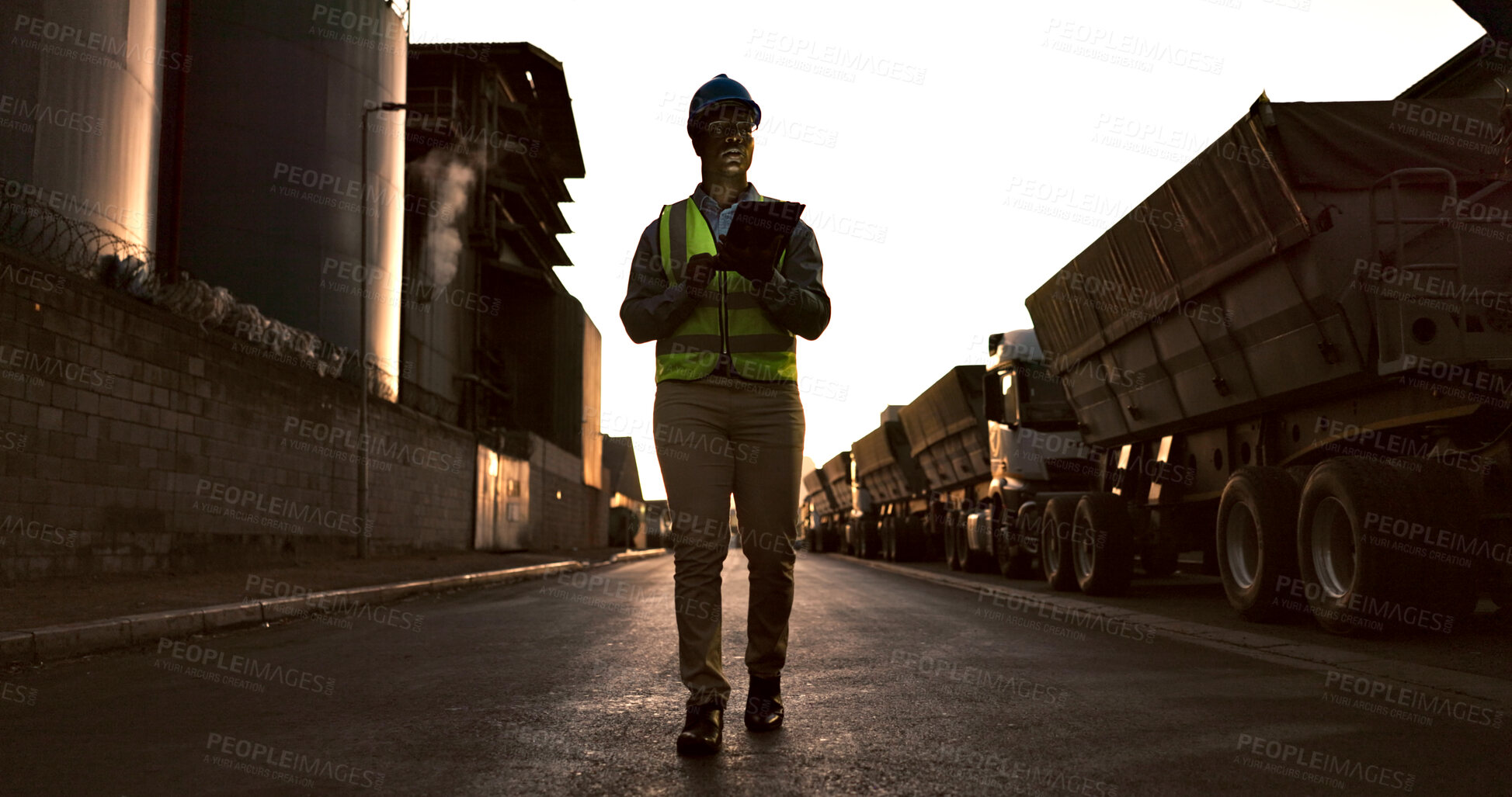 Buy stock photo Construction worker, man or walking with tablet on site in morning for vehicle inspection for logistics or cargo export. Shipping industry, manager and employee with digital app for quality control