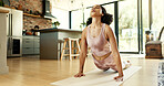 Yoga, stretching and woman in living room on floor for balance, spiritual wellbeing or healthy body. Fitness, wellness and yogi person for flexibility, cobra pose or pilates on mat in home