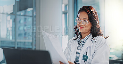 Buy stock photo Woman, doctor and smile with paperwork or laptop for research or study results and feedback. healthcare, medical and happy or satisfied with document for medicine or patient information in office