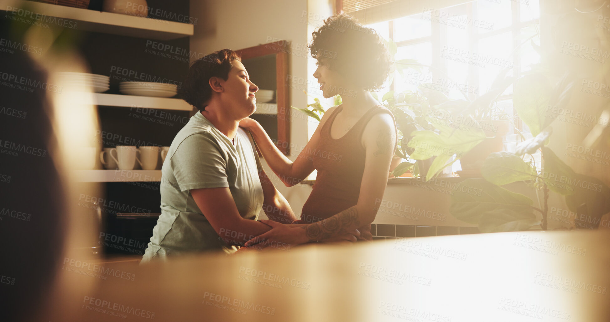 Buy stock photo Women, couple and lesbian in kitchen with smile for trust 
to relax and enjoy. Support, care and happy or conversation with affection to chill, fun and bonding in home for partnership or relationship